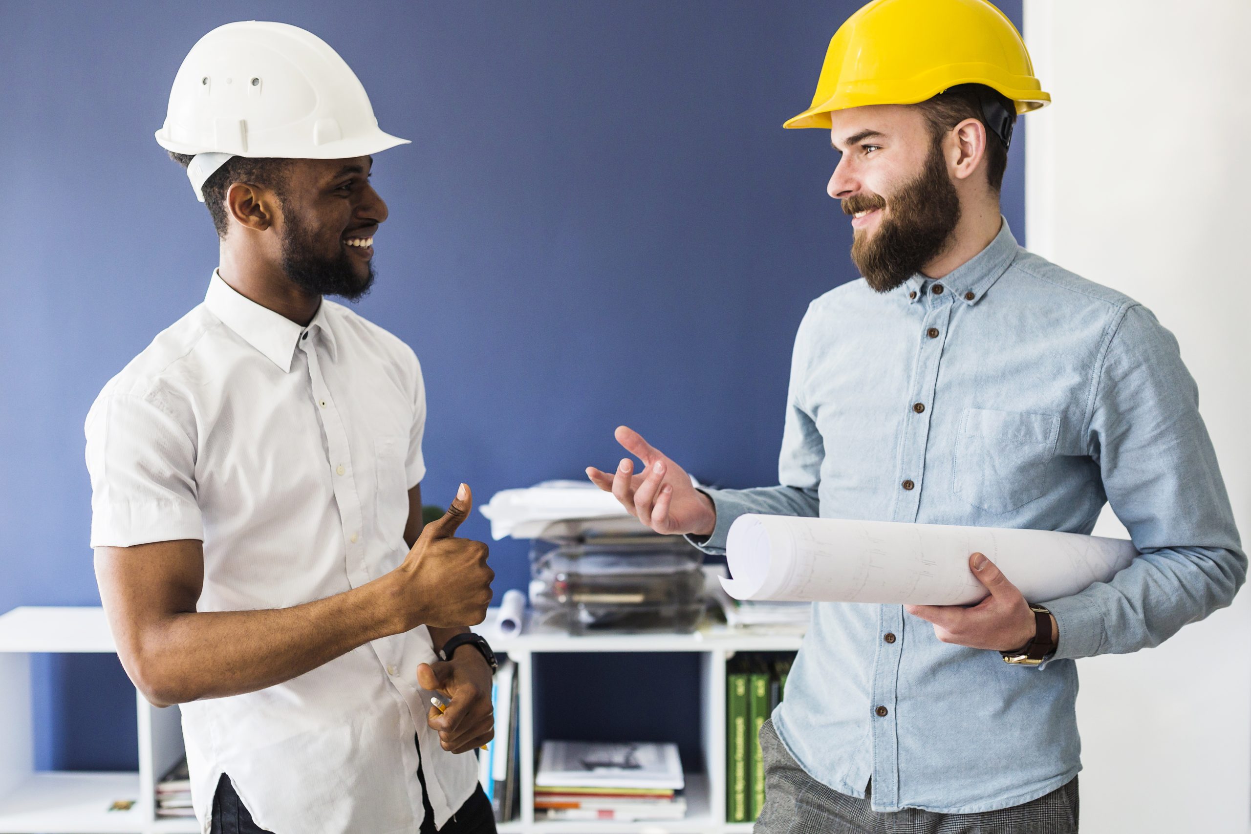 two successful male architect have conversation office