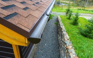 Holder gutter drainage system on the roof Drain on the roof of the house Roof drainage Water drainage from the roof